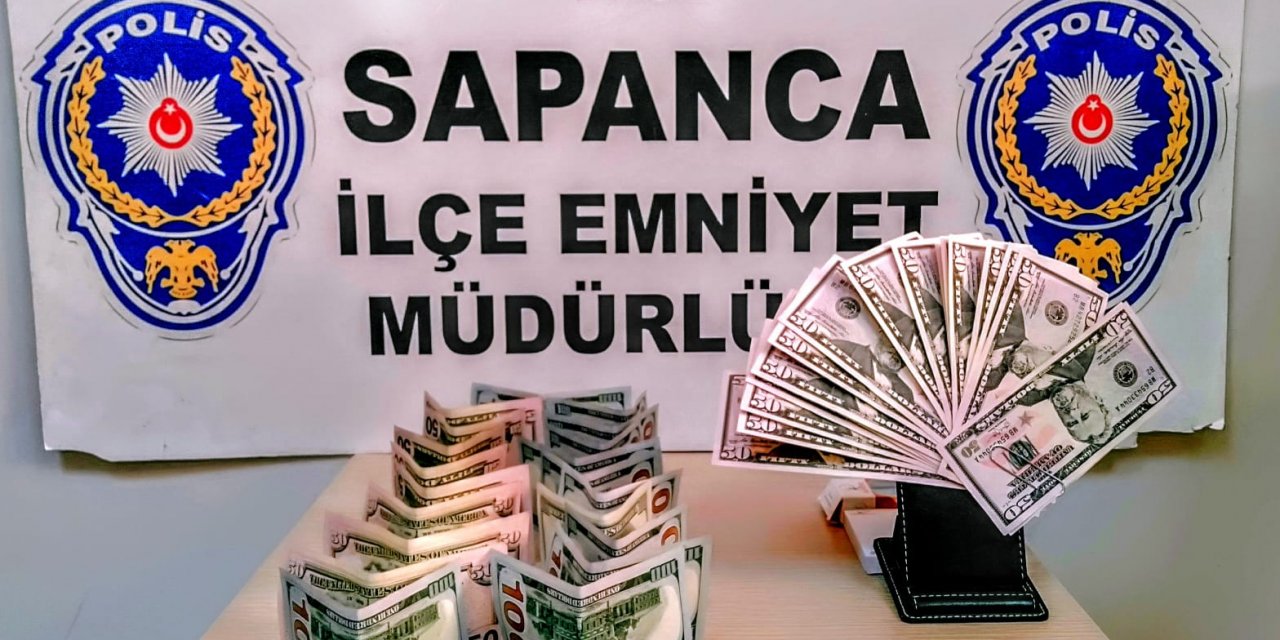 Sahte dolarla esnafı dolandıran Suriyeli  yakalandı