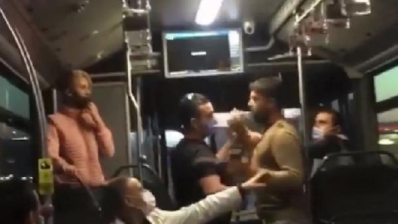 Metrobüste tartışma! Birbirlerinin yüzüne tükürdüler