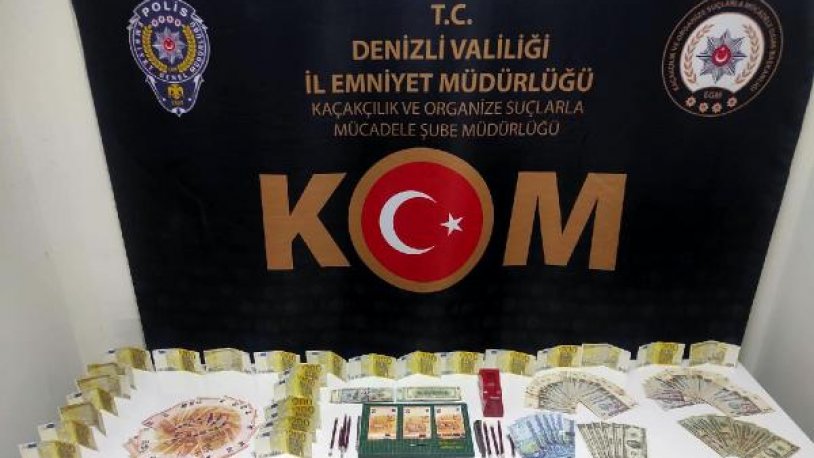 Polisi şaşkına çeviren sahte parada ilginç yöntem