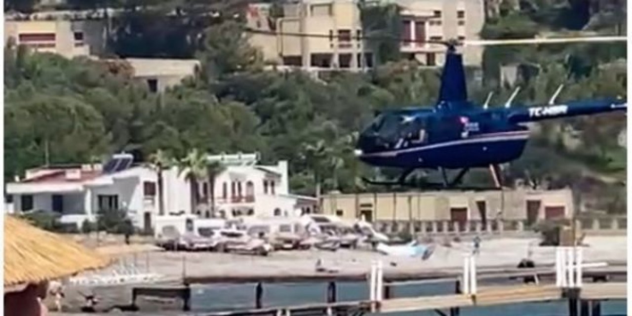 Halk plajına helikopterle inilmişti... O helikopterin sahibi bakın kim çıktı? İşte detaylar...