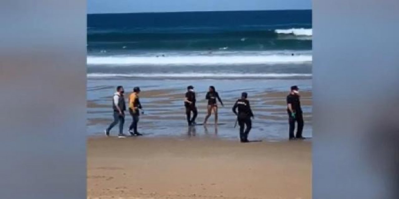 koranavirüslü hasta denize girdi, polis gözaltına aldı