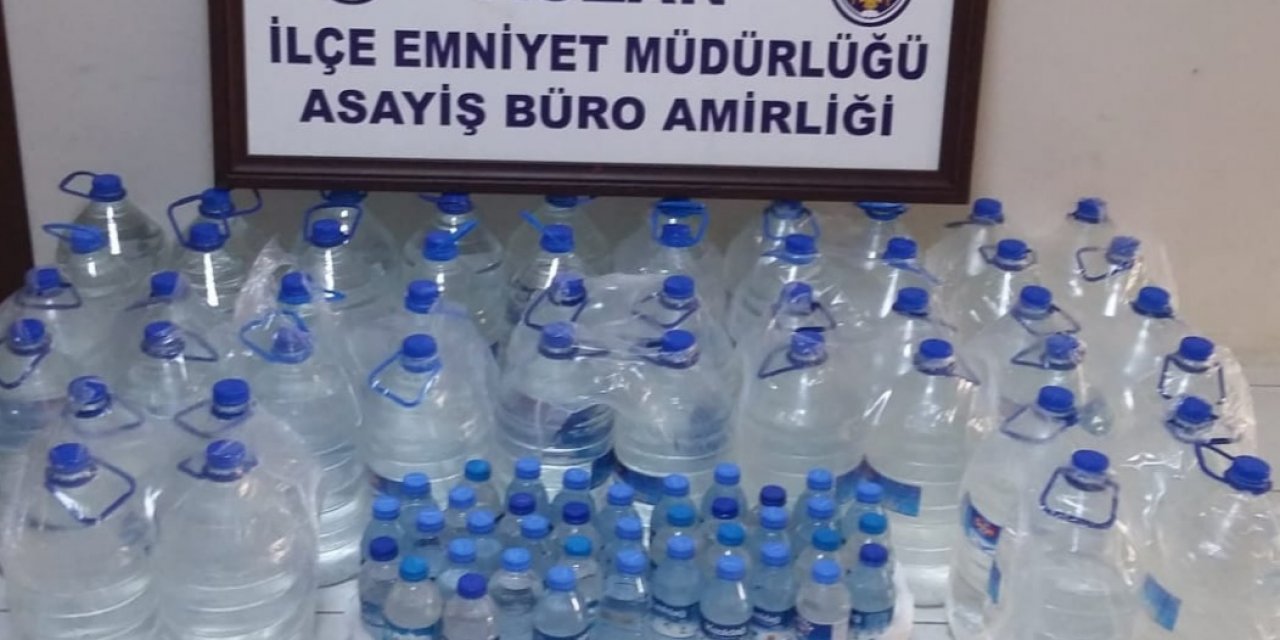 Kozan'da sahte içki üretip, satan kişinin evine baskın; 259 litre ele geçirildi