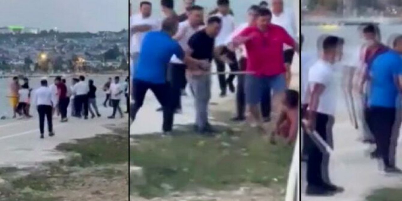 Sopalarla saldırdılar... Restoran çalışanlarından denize giren vatandaşlara "gürültü" dayağı!