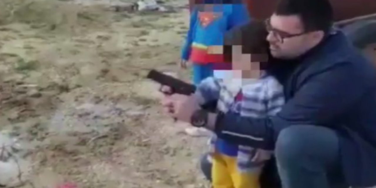 Küçücük çocuğun eline silah verip atış yaptırdı! AKP'li Başkandan skandal paylaşım!