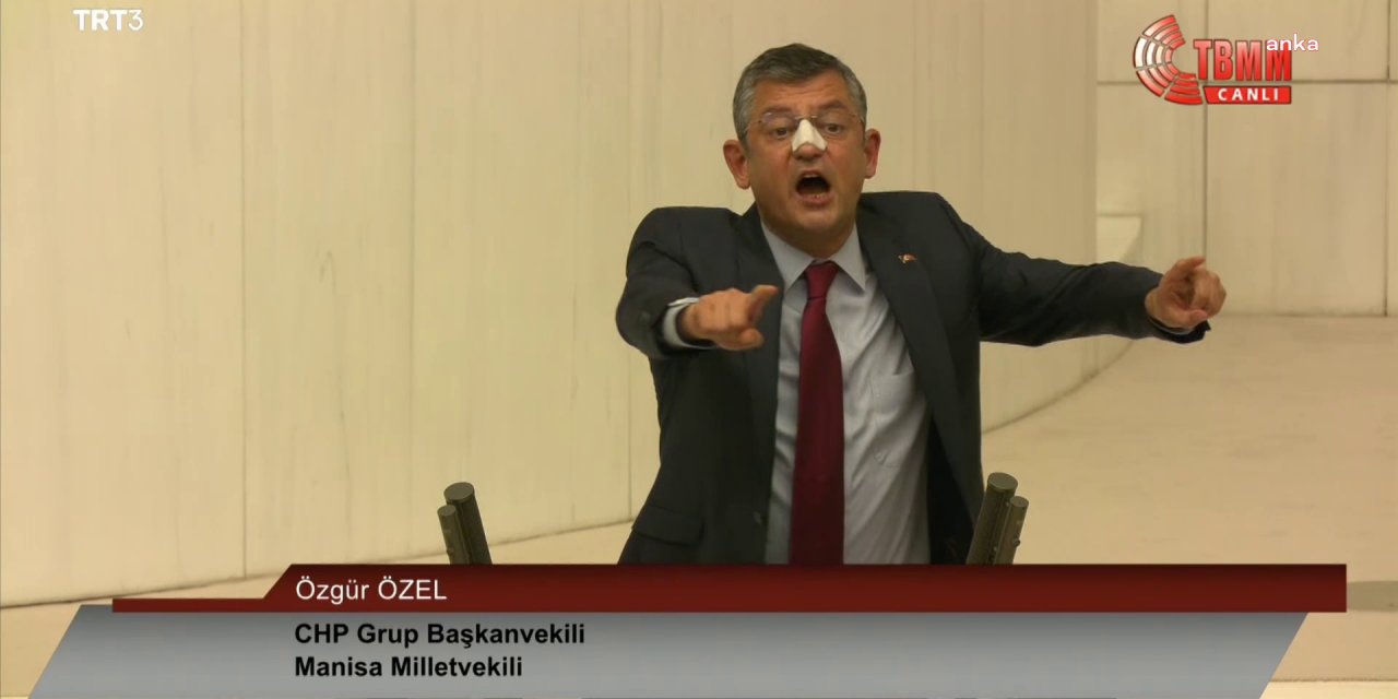 TBMM GENEL KURULU KARIŞTI, AKP’Lİ ÖZALAN CHP’Lİ MİLLETVEKİLLERİNE YUMRUK SAVURDU