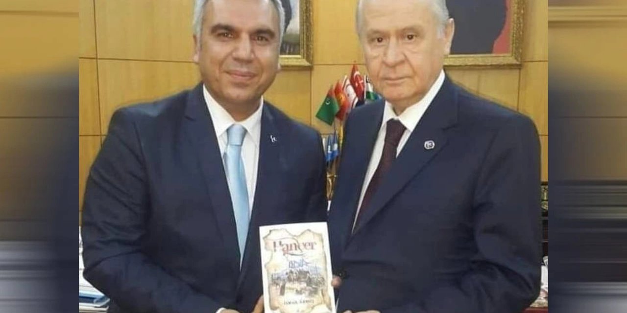 MHP'li aday, kendisiyle aynı isme sahip ölen yazarın kitabını sahiplendi; Bahçeli'ye hediye etti