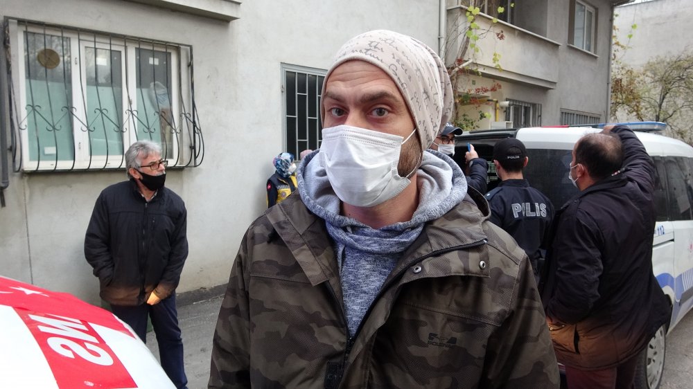 Binayı yakan şüpheliyi mahalleli yakaladı, linç edilmekten polis kurtardı