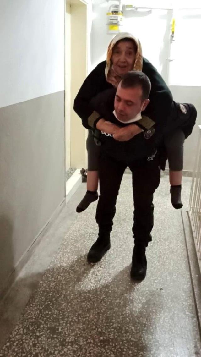 Polis memuru, yaşlı kadını 5'inci kata sırtında çıkardı