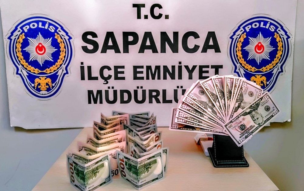 Sahte dolarla esnafı dolandıran Suriyeli  yakalandı