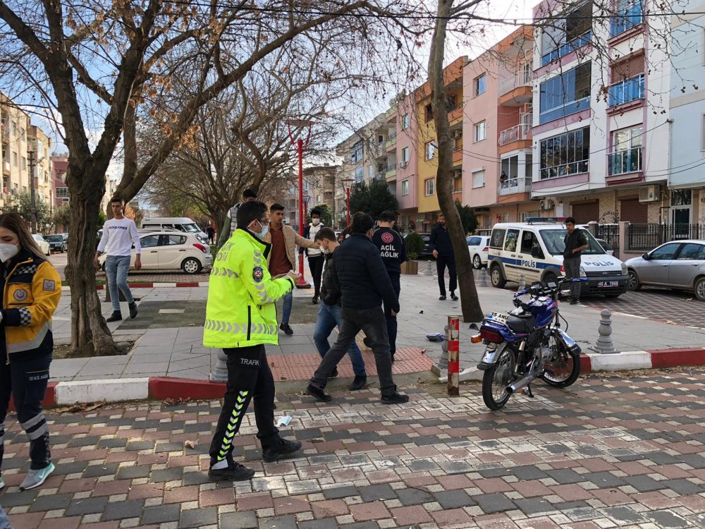 Otomobil ile çarpışan motosikletin 'kasksız' sürücüsü yaralandı