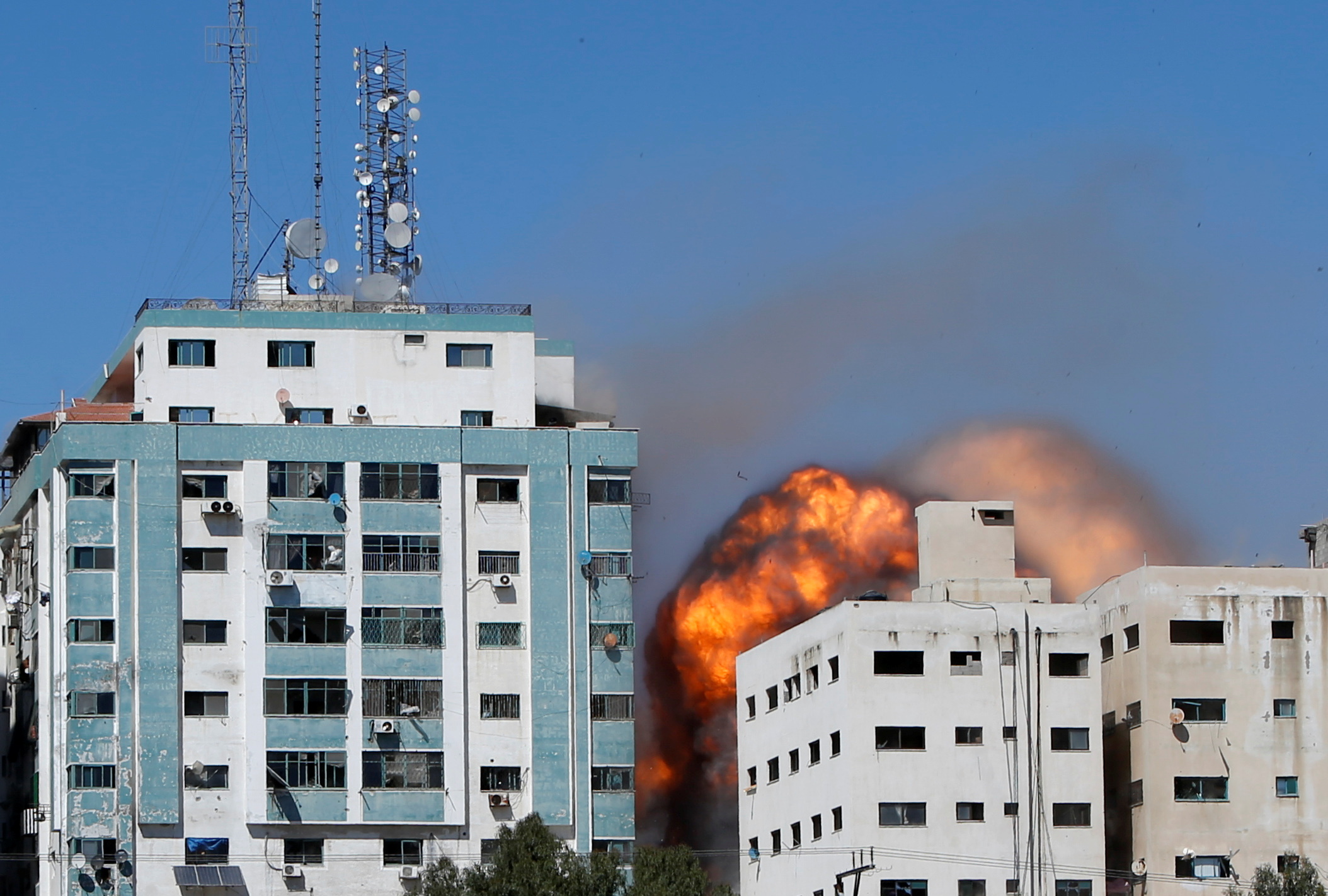 155914307-2021-05-15t125549z511493296rc2cgn9skeohrtrmadp3israel-palestinians-tower-media.jpg